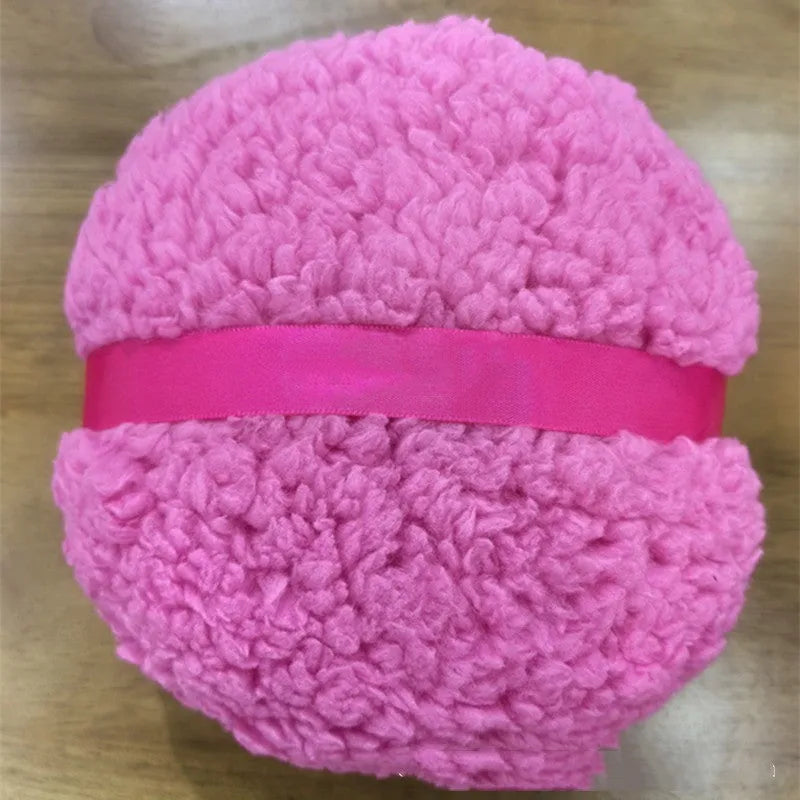 Oversized rectangular plush powder puff measuring 150x75mm in white colour