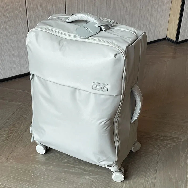20-inch waterproof Oxford cloth suitcase in bluestone green colour with universal wheels and antibacterial lining