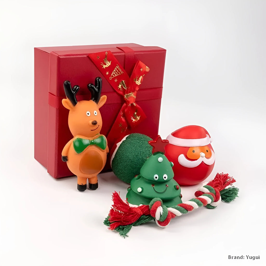 Christmas dog chew toys set with vinyl Santa heads, trees, and festive shapes in gift packaging