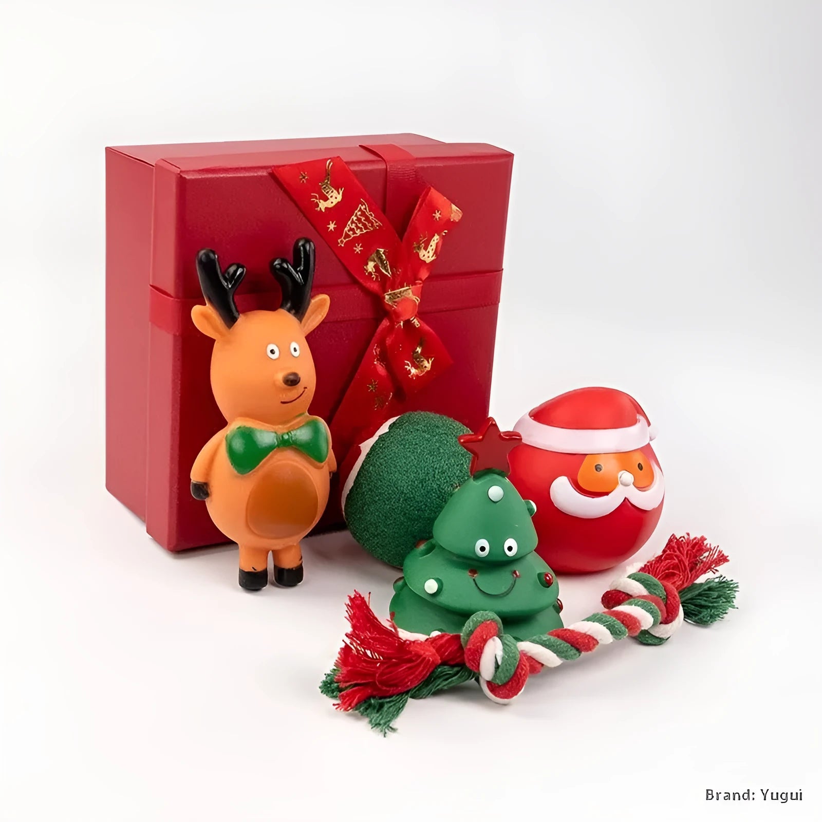 Christmas dog chew toys set with vinyl Santa heads, trees, and festive shapes in gift packaging