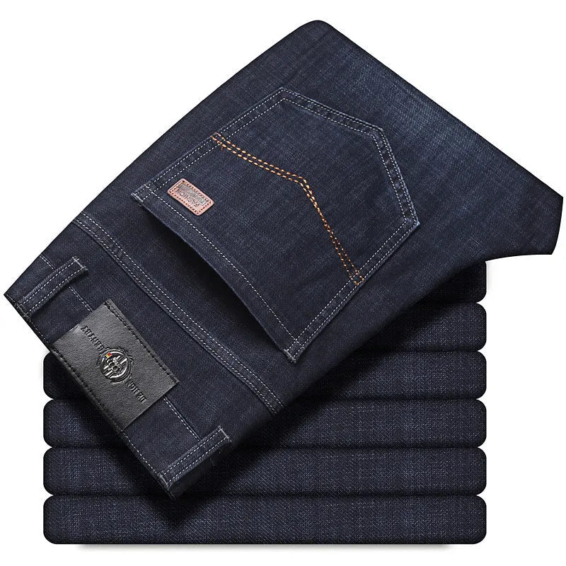 Black and blue loose fit stretch jeans straight-leg trousers on a hanger