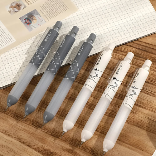 White and black 0.5mm automatic pencils with cloud grip design on plastic body