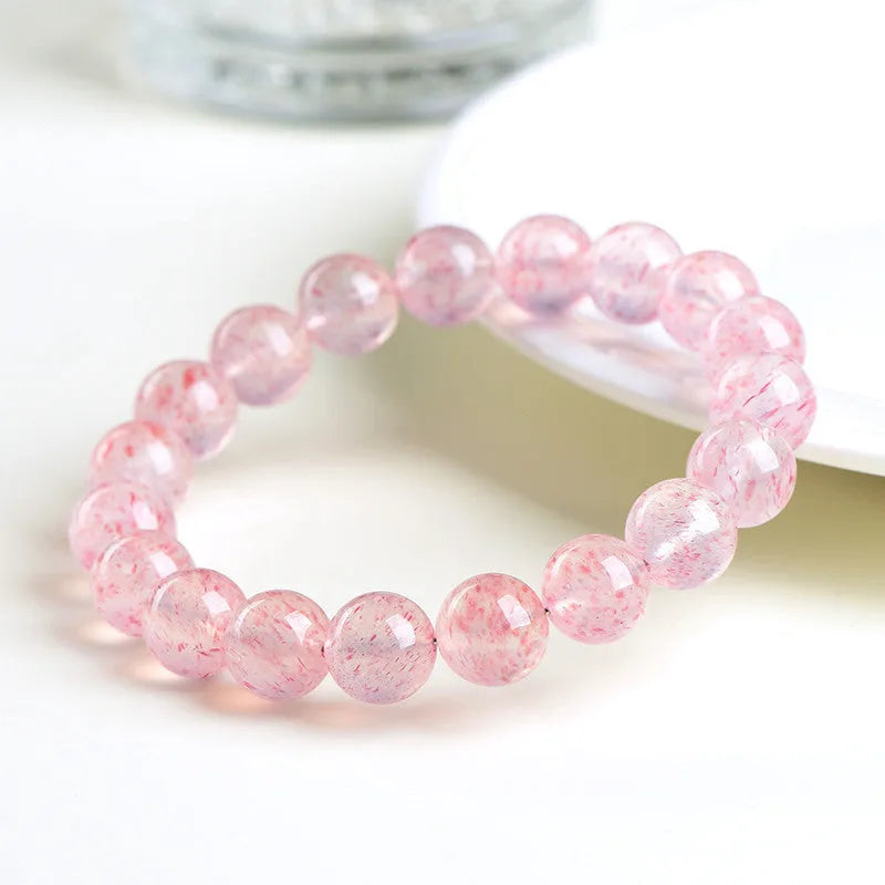 Strawberry quartz crystal ball bracelet with white water colour and 10-10.8mm geometric beads