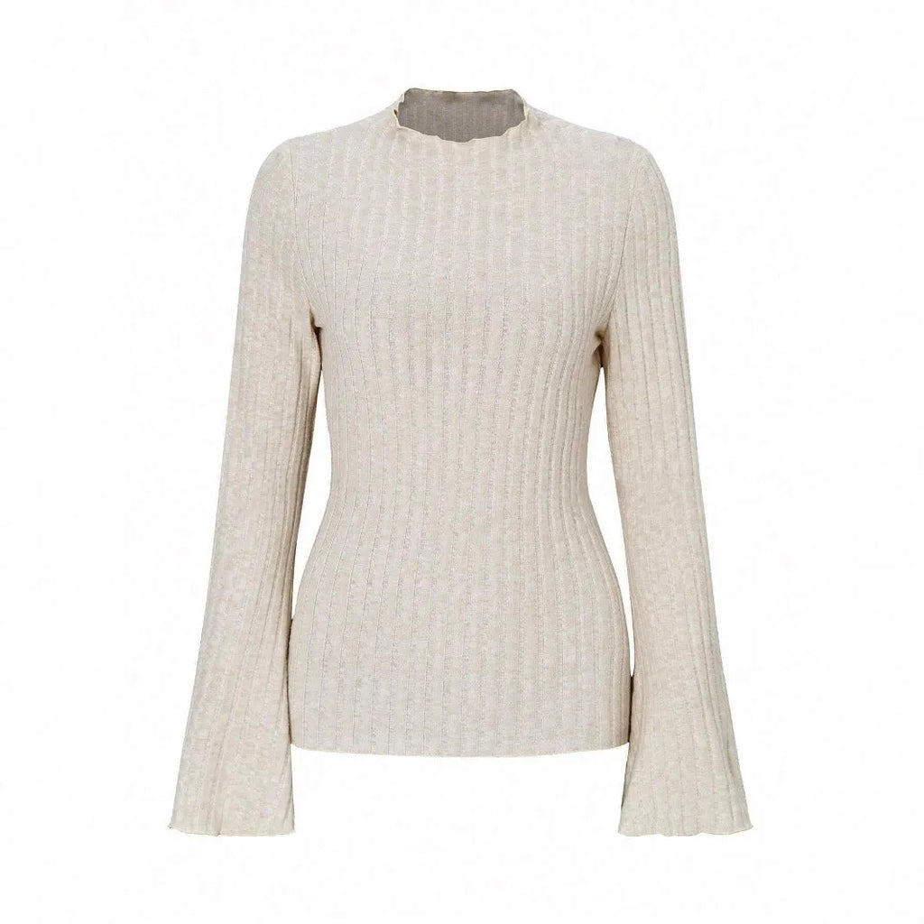 Man wearing a slim-fit long sleeve black top with a subtle brushed stripe texture and round neck.