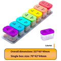 White and rainbow coloured extra large plastic pill organiser with 14 removable compartments.