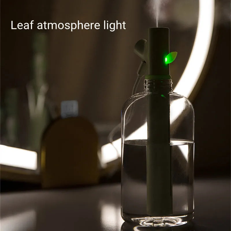 Transparent portable USB humidifier with ultrasonic mist production on desk