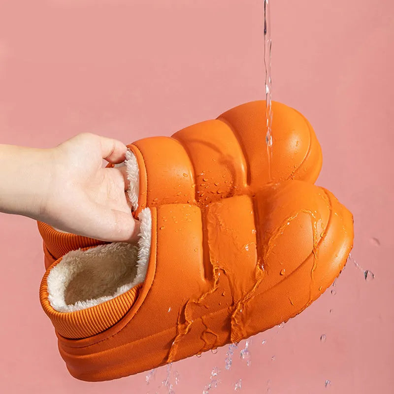Women's waterproof EVA garden slippers in assorted colours with plush lining and non-slip soles.