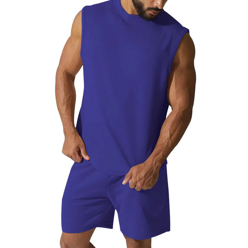 Men's sleeveless sports suit consisting of thin cotton blend top and matching shorts in solid colour