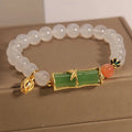 Women's white agate jade bracelet with bamboo joint beads in a retro Chinese style.