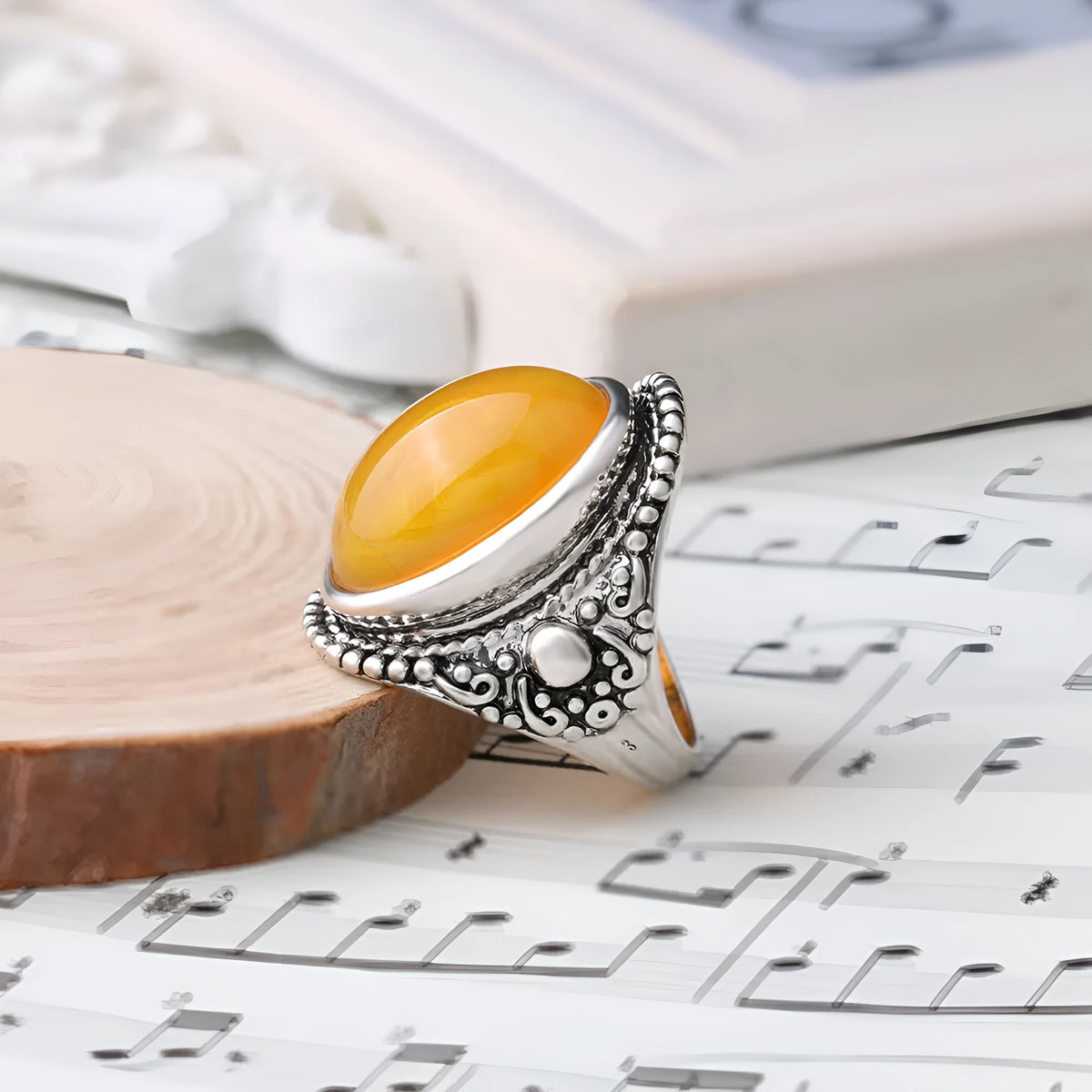 Retro geometric alloy ring with fluorescent beeswax and antique silver plating, shown in size 10.