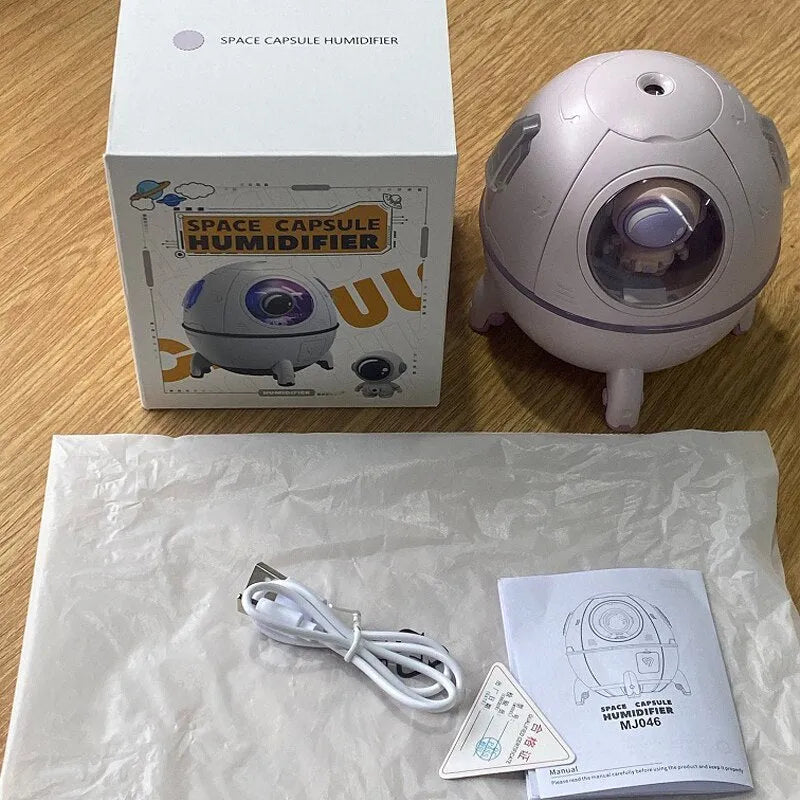 Astronaut-themed USB desktop humidifier with colourful LED lights and 220ml water tank