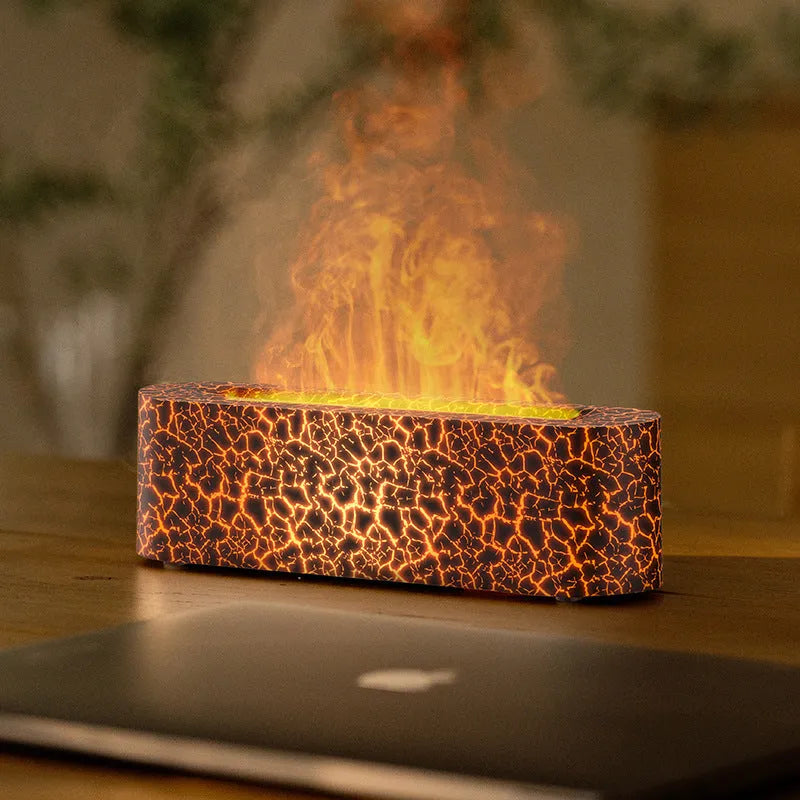 Square creative lava flame atmosphere humidifier and aroma diffuser with colourful LED lights on a desktop.