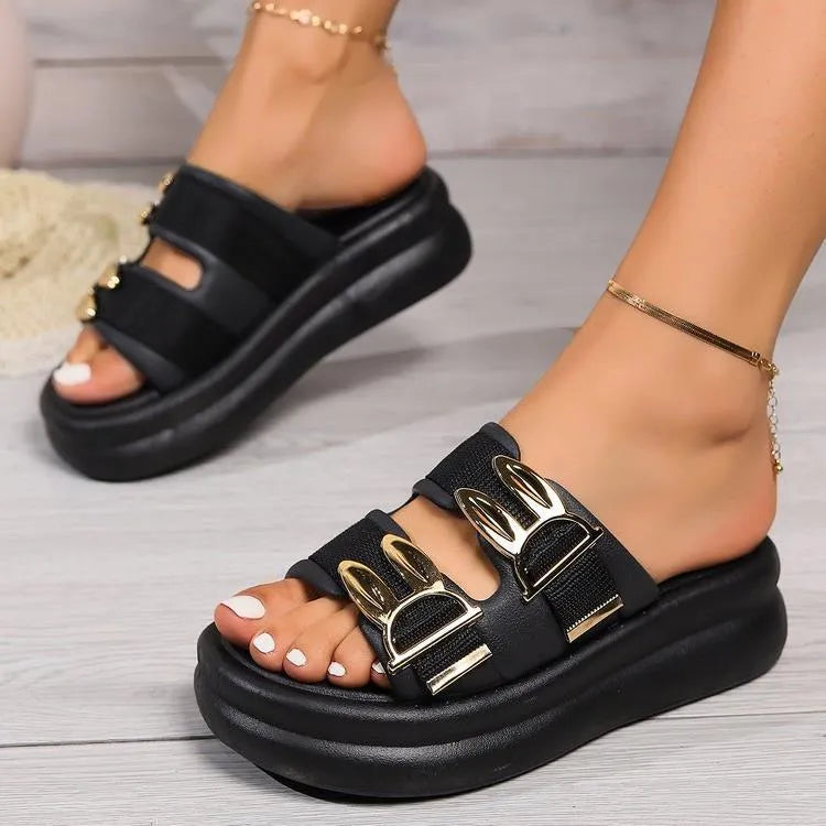 Women's apricot suede slippers with thick rubber soles shown from the side
