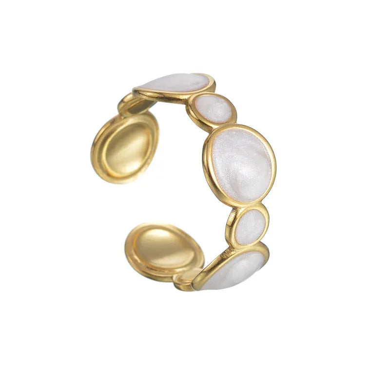 Simple stainless steel geometric ring for women with an adjustable opening.