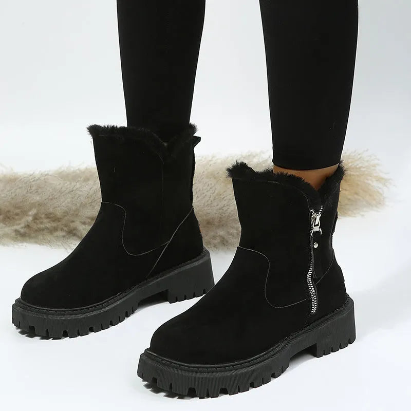 Women's black thick plush snow boots with side zipper, faux suede upper, and non-slip rubber sole.