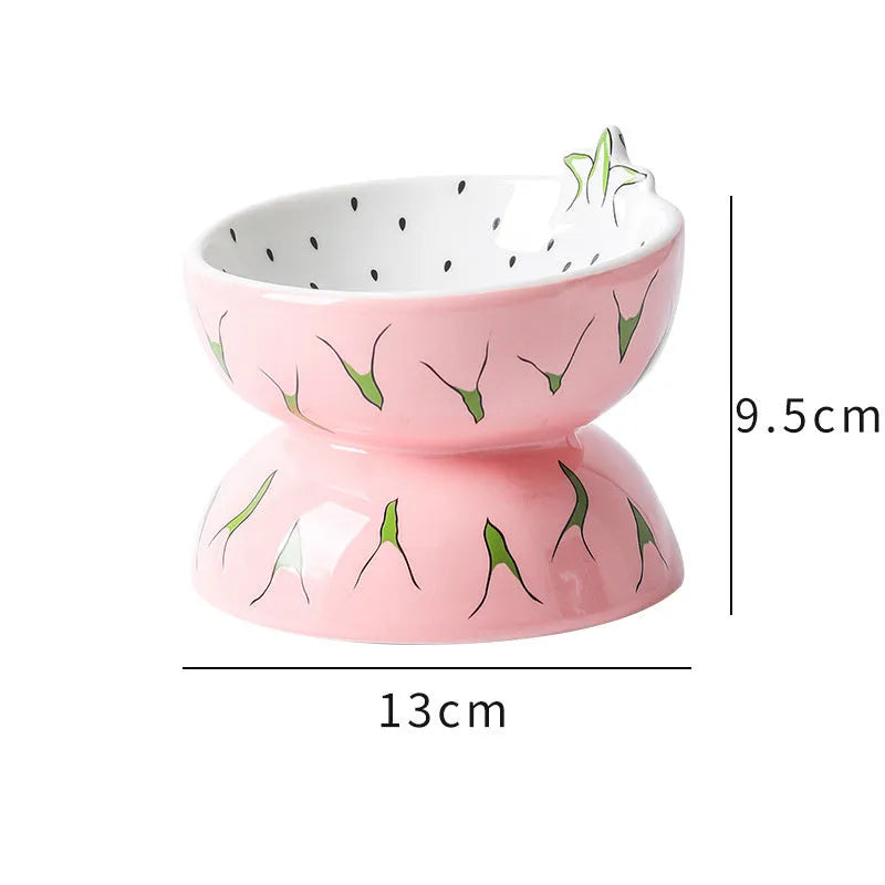 Ceramic elevated cat bowl in orange colour with tilted wide dish design.