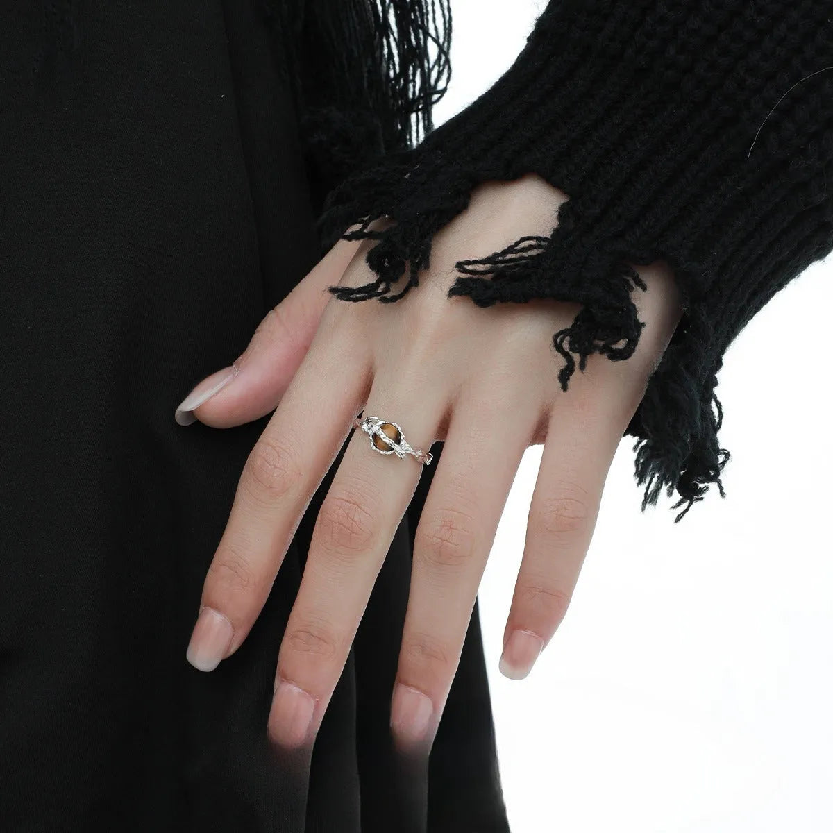 Adjustable opening women's ring with Saturn design in white gold colour electroplated silver