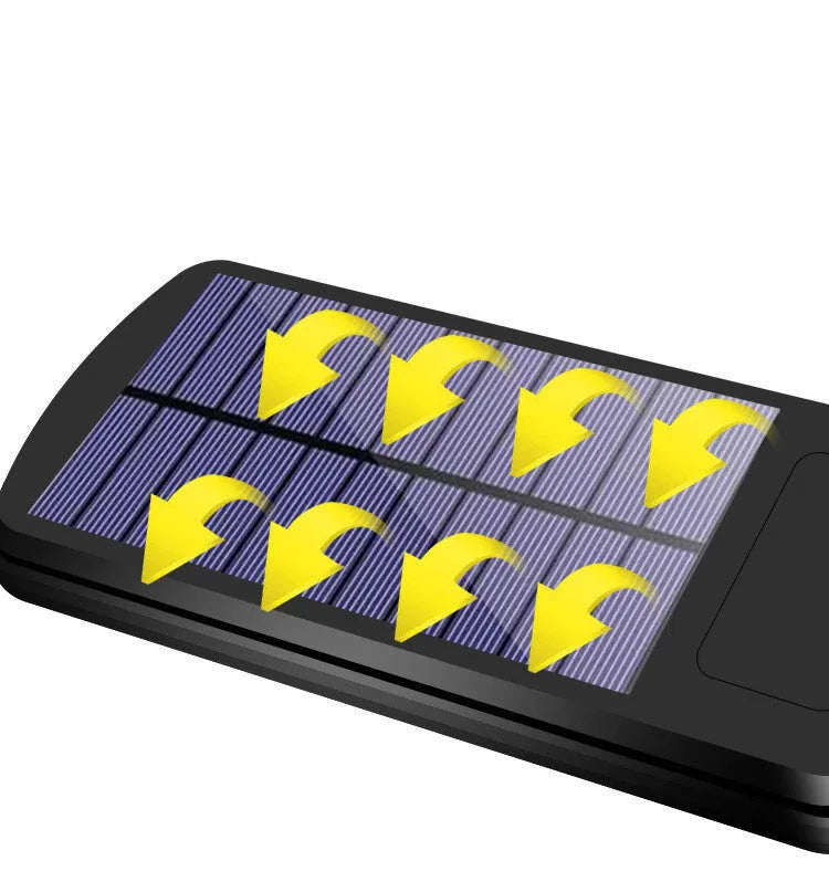 Black outdoor solar motion sensor light for garden or pathway mounting.