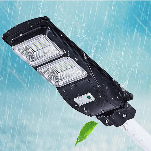Integrated solar street light with solar panel and LED light in single unit for outdoor areas