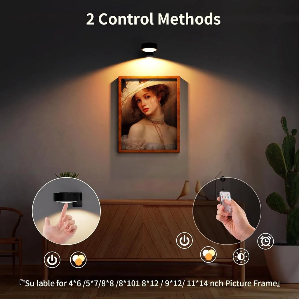 Magnetic wireless LED picture light with remote control in black finish illuminating a painting
