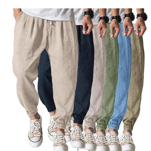 Men's casual cotton trousers with ankle bands in light green colour showing loose fit design