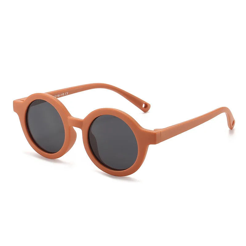 Soft silicone round-frame sunglasses for babies and toddlers aged 0-3 years with polarised UV400 lenses.