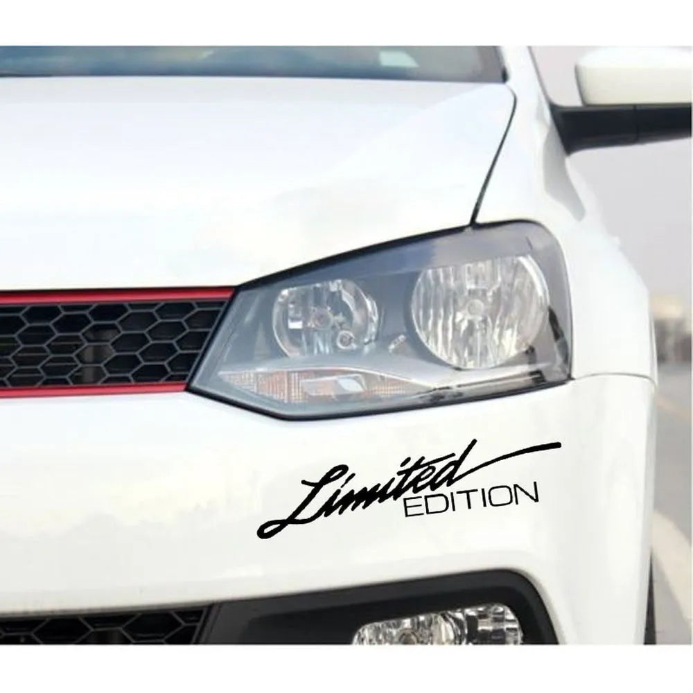 Close-up of a reflective plastic bumper sticker showing British style text, measuring 16cm long.