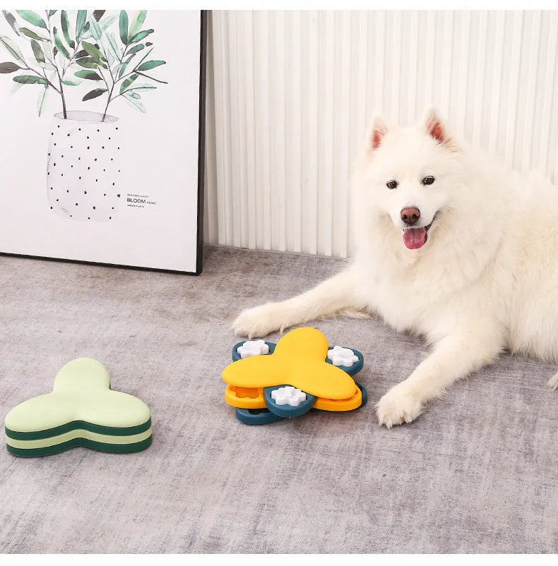 Green and yellow dog puzzle toy with bone-shaped covers and non-slip base.