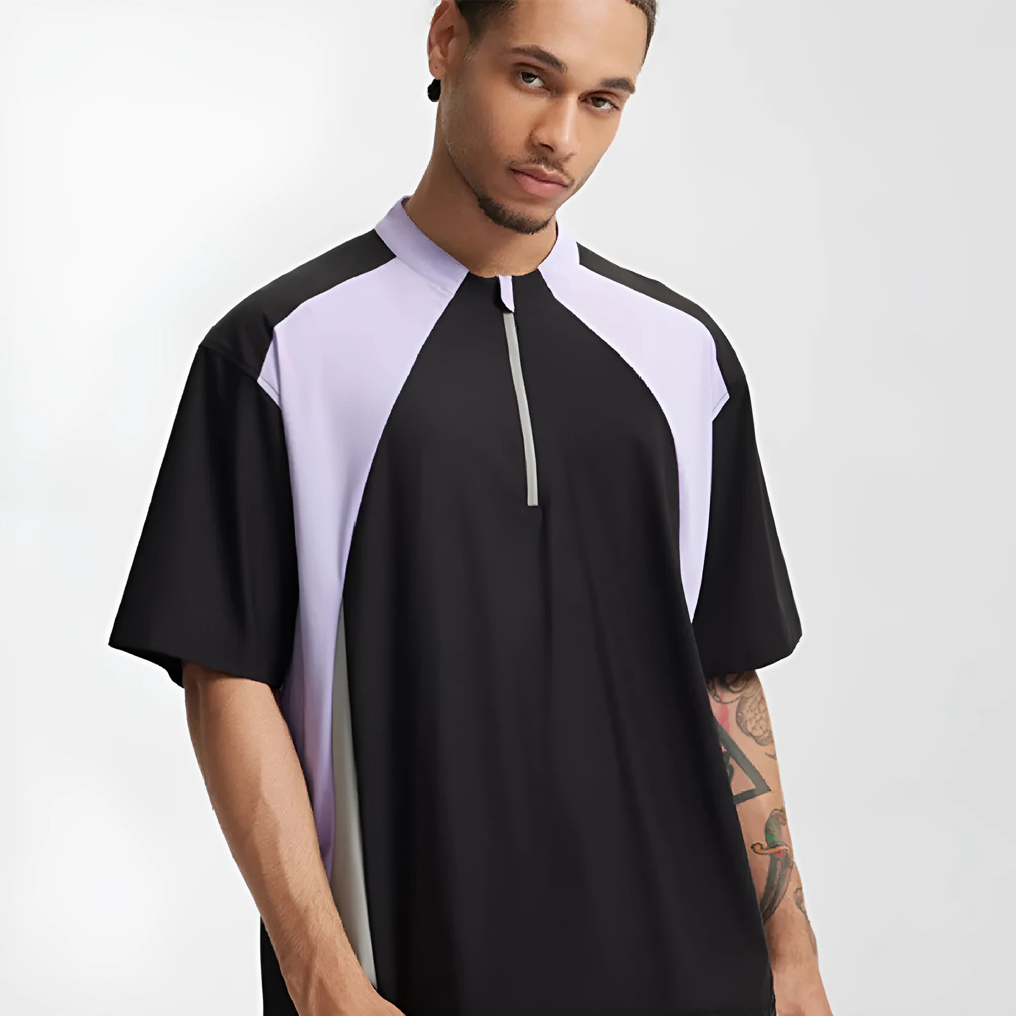 Men's lightweight solid colour polyester top in black, available in short sleeve and long sleeve styles.