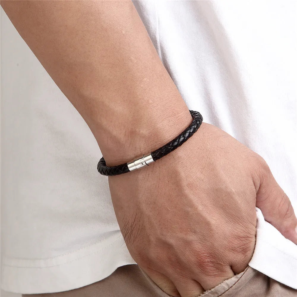 Titanium steel geometric wire bracelet with magnet clasp shown in unisex boyfriend style