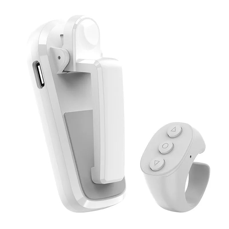 Wireless page turner remote control in black, pink, or white colour with clickers for tablets and phones.