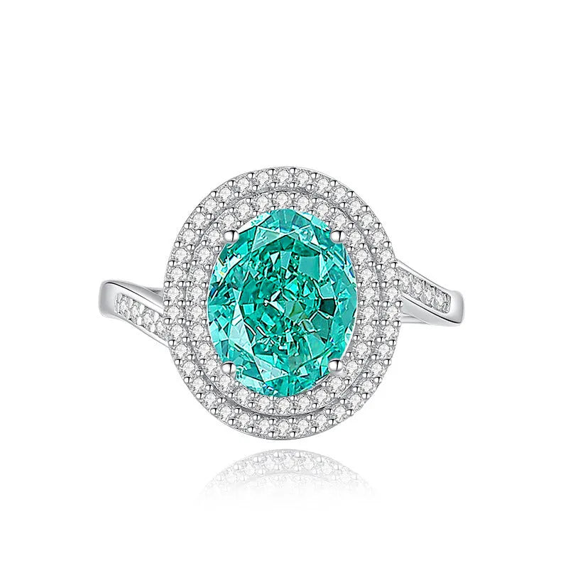 Geometric S925 sterling silver women's ring with an oval Palaibahao emerald and diamond accents.