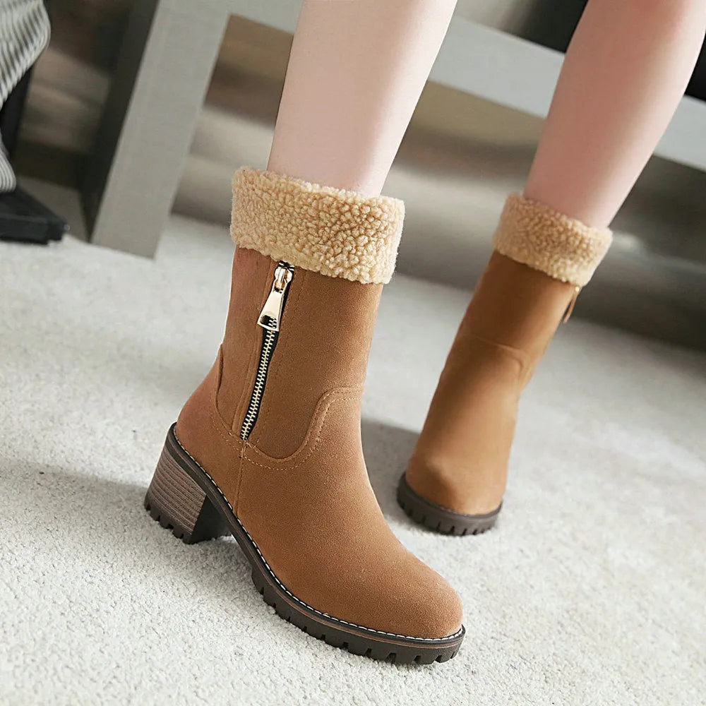 A pair of snow boots with a rubber sole and plush lining in one of four colour options.