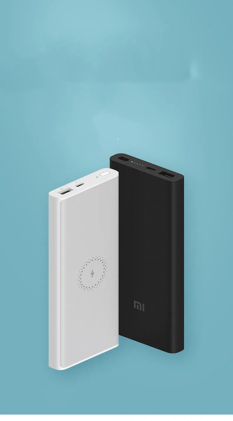 Black and white 10000mAh capacity power bank with wireless charging and USB ports