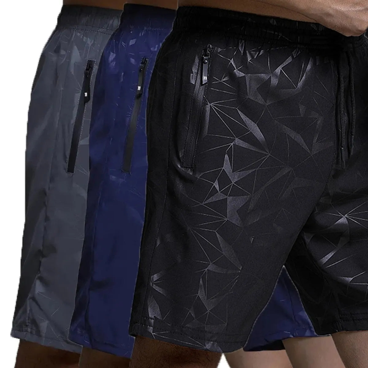 Man wearing loose grey polyester sports shorts on a beach