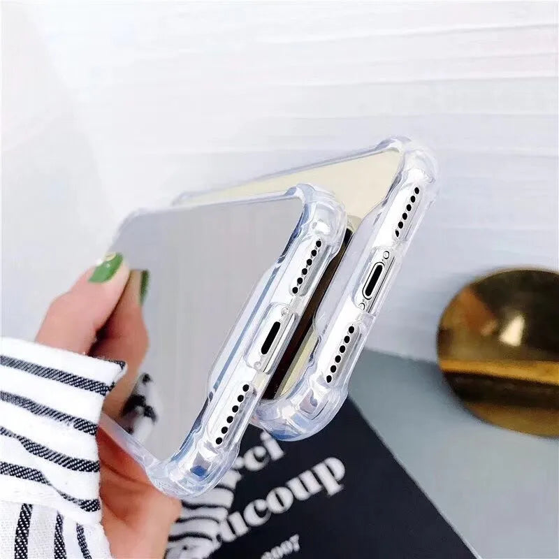 Soft TPU Mirror Phone Case for iPhone in multiple colours on a table.