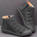 Women's casual flat ankle boots in various colours with a round toe and rubber sole.