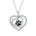 Women's dog paw footprint necklace with heart design on copper pendant and cross chain