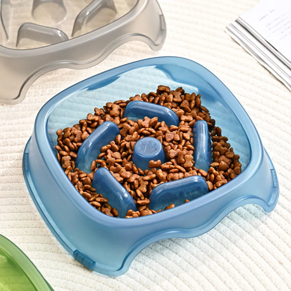 Plastic dog slow feeder bowl with anti-choking ridges in blue, grey, green, and orange colour options