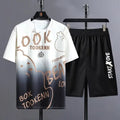 Men's thin polyester summer tracksuit set with short sleeve top and shorts in a casual colour.