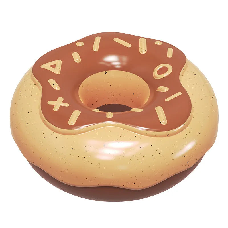 Pink, yellow, and chocolate TPR donut-shaped dog toy with textured surface for teeth cleaning