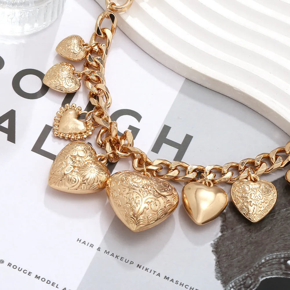 Adjustable alloy heart pendant necklace in gold and white K options with exaggerated love design