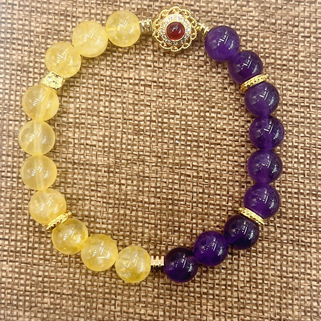Handmade women's amethyst crystal bracelet with yellow and purple beads