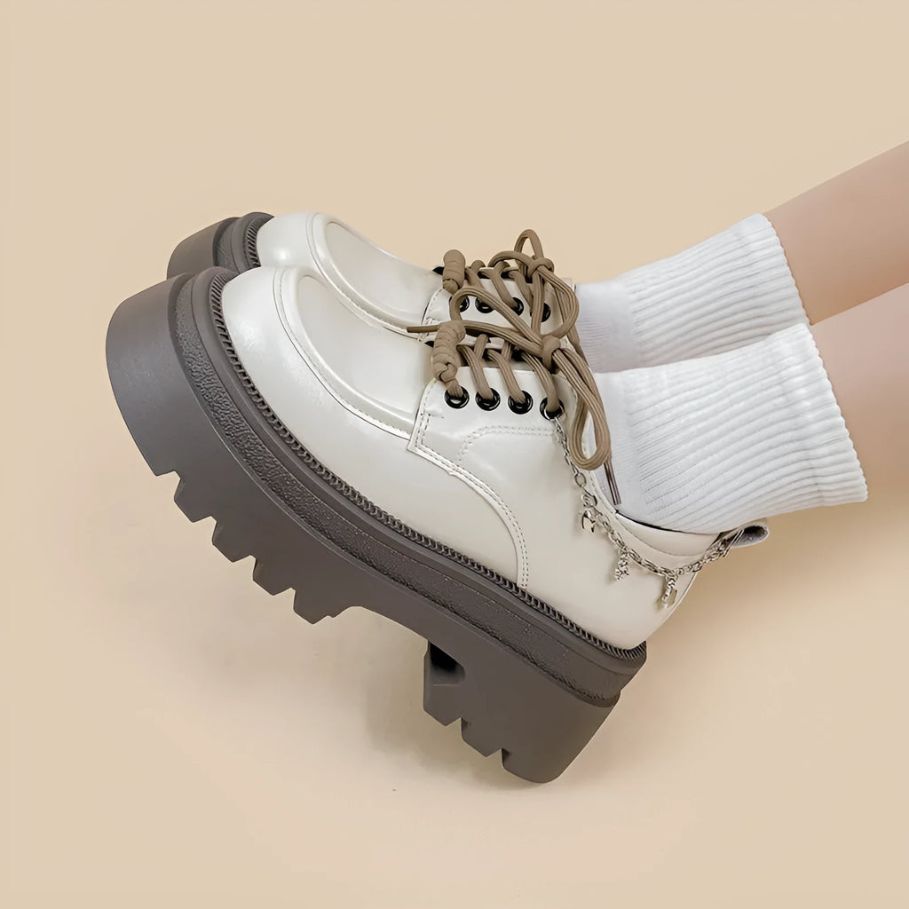 White women's platform leather shoes with chunky heel and front lace-up, round toe.