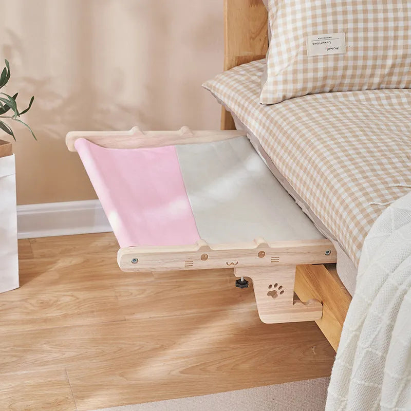 Wooden cat hanging bed hammock mounted on a balcony railing, one of seven available style variations.