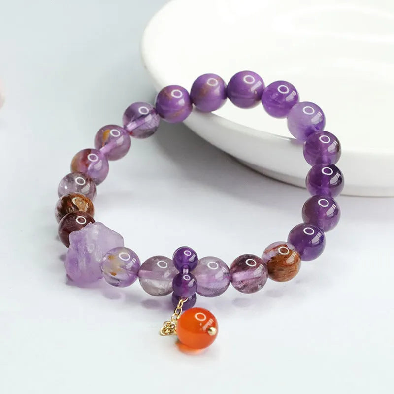 Natural nine purple crystal bracelet with amethyst beads and red agate stones in Mori style design
