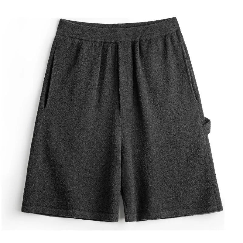 Cement grey polyester sports shorts with straight cut design and elastic waistband