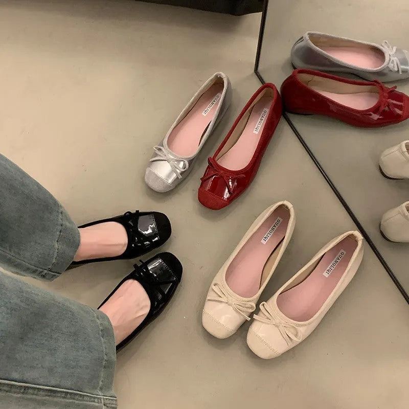 Retro ballet-inspired Mary Jane shoes with square toe, bow detail, and a mid heel, shown in apricot colour.