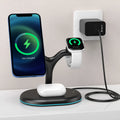 Black minimalist magnetic wireless charger for iPhone MagSafe on a table.