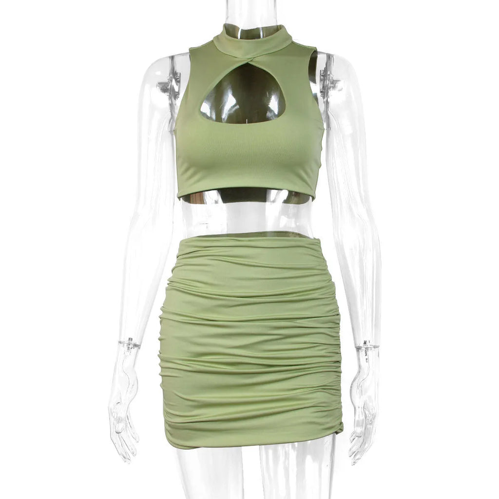 Light purple two-piece skirt set with hollow vest top and matching skirt for commuting wear